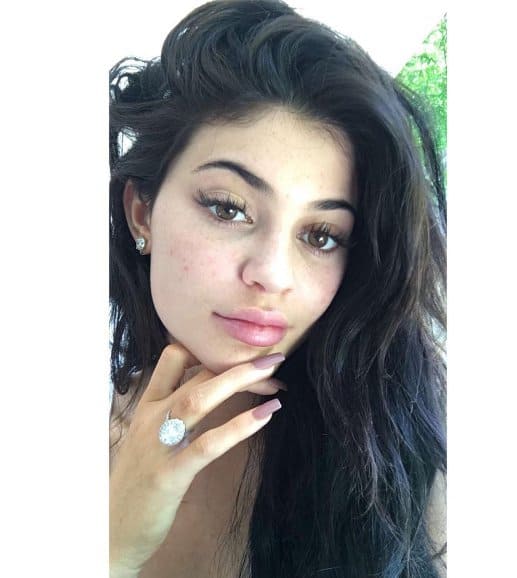 Kylie Jenner flaunts her glowing complexion and massive promise ring in a casual yet stunning selfie
