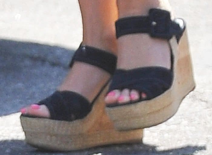 A closer look at Reese Witherspoon’s black suede Prada wedge sandals, complete with espadrille soles and a flirty summer-ready finish