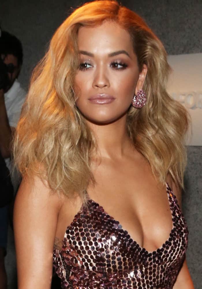 Rita Ora commanded attention in a mesmerizing, shimmering ensemble at the New York Fashion Week 2016 menswear presentation for Tom Ford