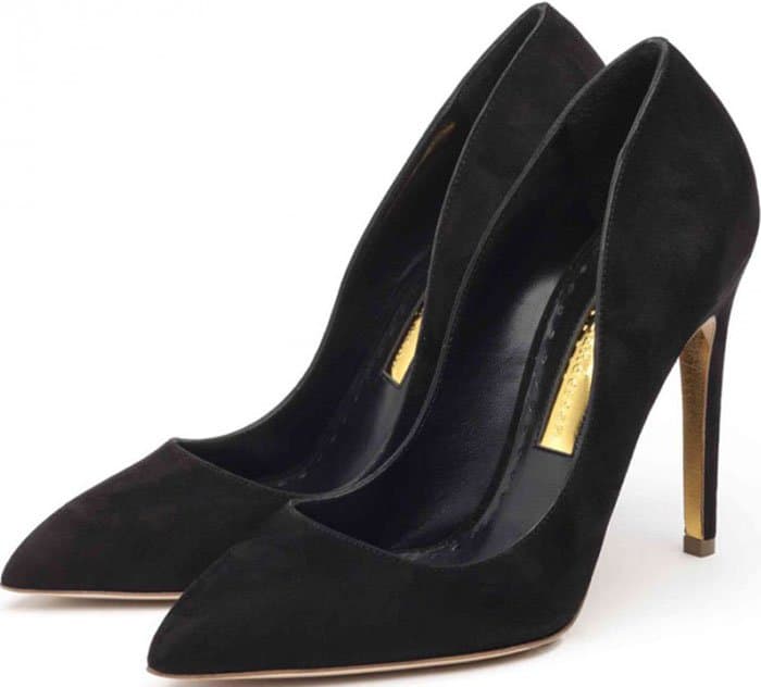 Black Rupert Sanderson “Elba” pumps — a signature design featuring a sleek pointed toe, sculpted stiletto heel, and the label’s signature gold insole detailing