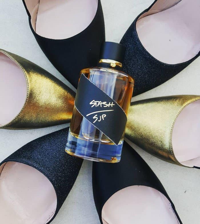 Sarah Jessica Parker shared a preview of her “Stash” fragrance on Instagram ahead of the launch, artfully placing the amber-toned bottle at the center of a circle of black and metallic gold SJP “Rampling” pumps