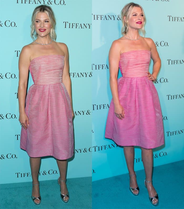 Ali Larter looked stunning in a Monique Lhuillier strawberry and lipstick pink strapless ottoman organza color-block dress, a vibrant look that beautifully contrasted the evening's sea of all-black ensembles