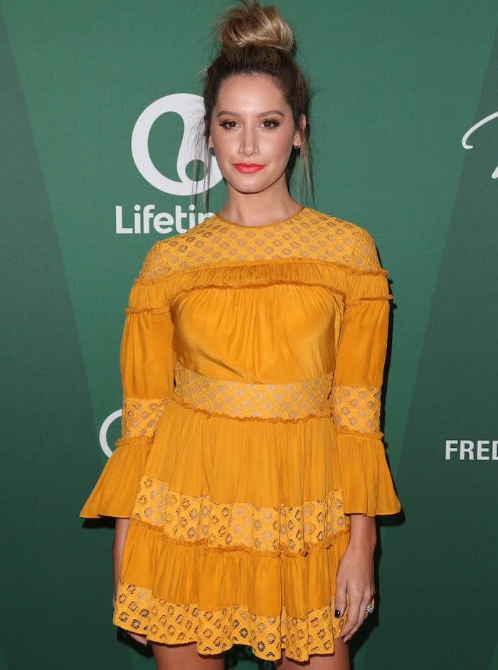 Ashley Tisdale's texture-rich Cinq a Sept dress is detailed with sheer, patterned cutwork and densely gathered trim