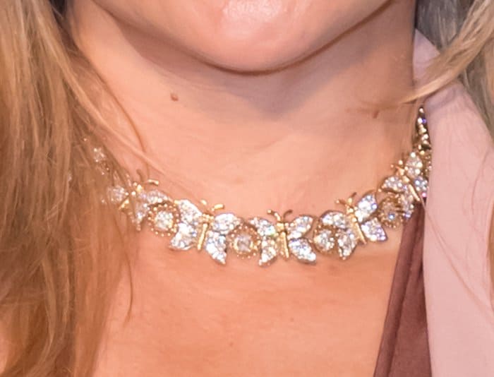 Kate Hudson's look is elevated by a stunning butterfly diamond necklace from Tiffany Co.