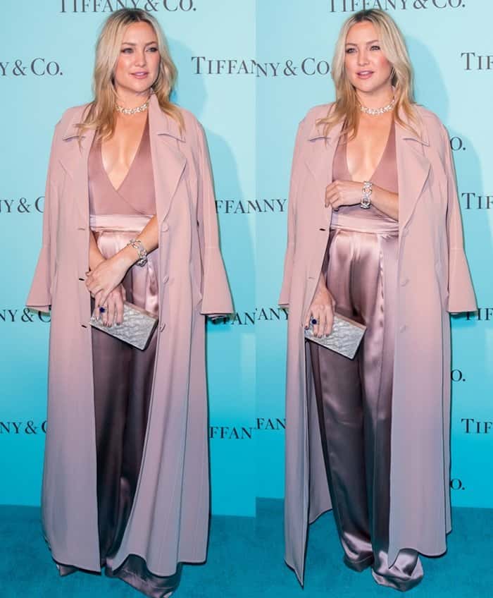 Kate Hudson stuns in a dusty rose Cushnie Et Ochs jumpsuit paired with a matching ankle-length coat at Tiffany Co.'s Beverly Hills store celebration