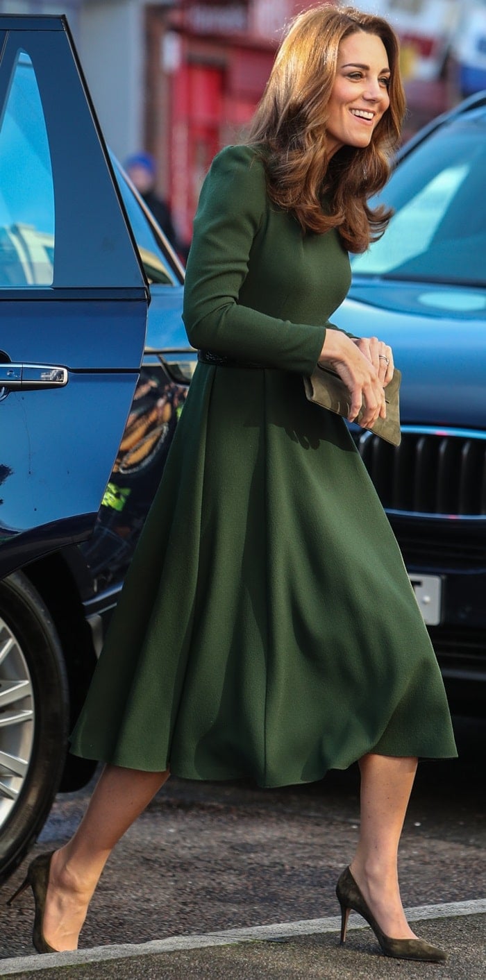 The Duchess of Cambridge in olive suede Gianvito Rossi pumps and a green midi dress by Beulah London