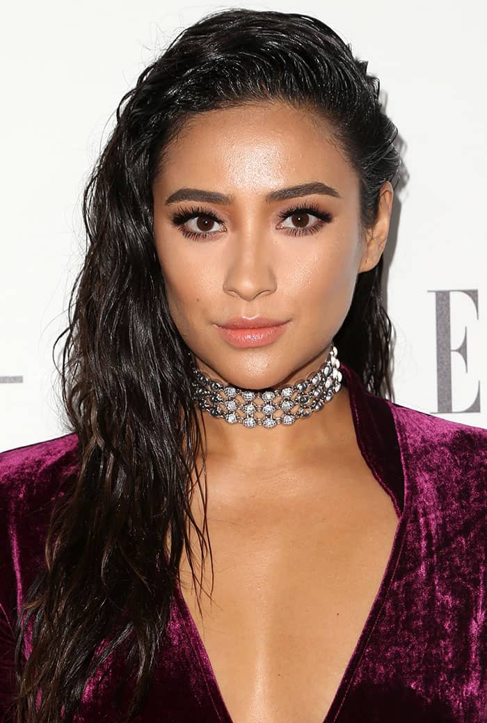 Shay Mitchell elevates her ensemble with sparkling diamonds and silver accessories, adding a touch of glamour