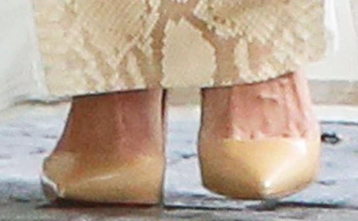 Alessandra Ambrosio stuck to her earthy palette with a pair of Christian Louboutin "So Kate" pumps in beige leather