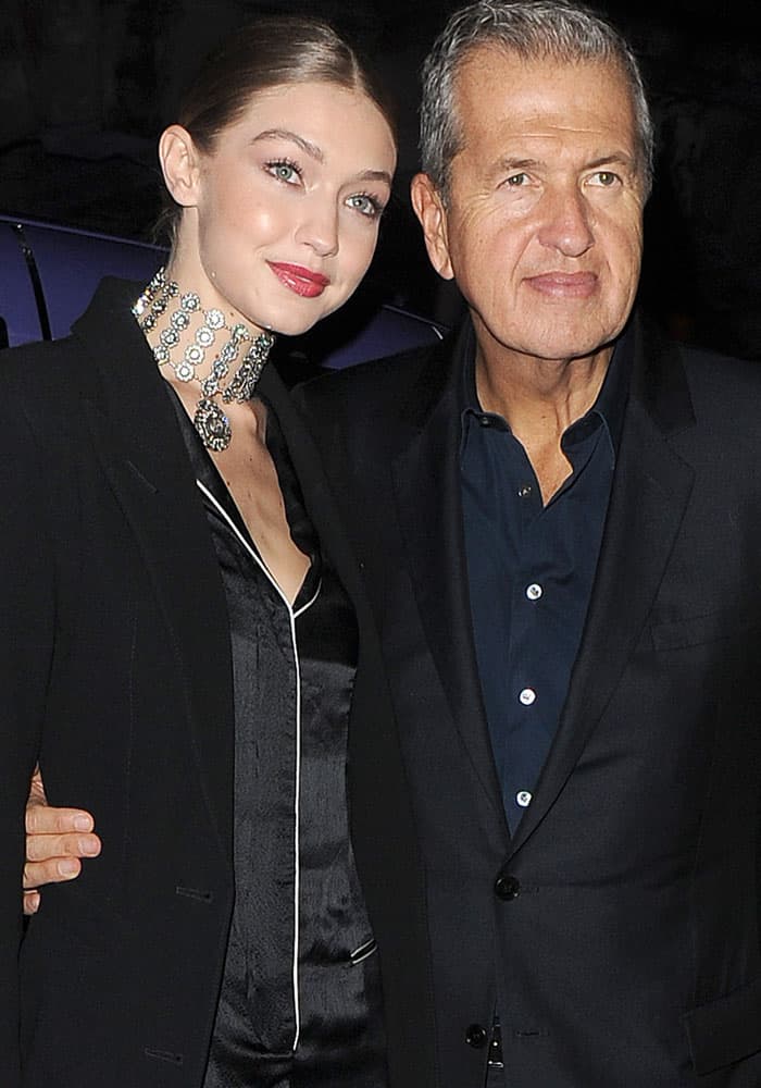 Gigi Hadid and Mario Testino arrive at the Royal Academy of Arts in London for the Stuart Weitzman VIP dinner