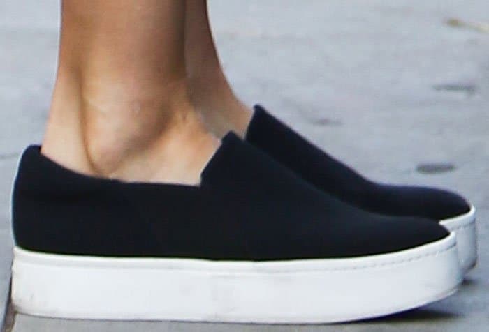 Jessica Alba styled her casual breakfast look with Vince "Warren" platform slip-on sneakers, known for their minimalist design and comfortable, elevated sole