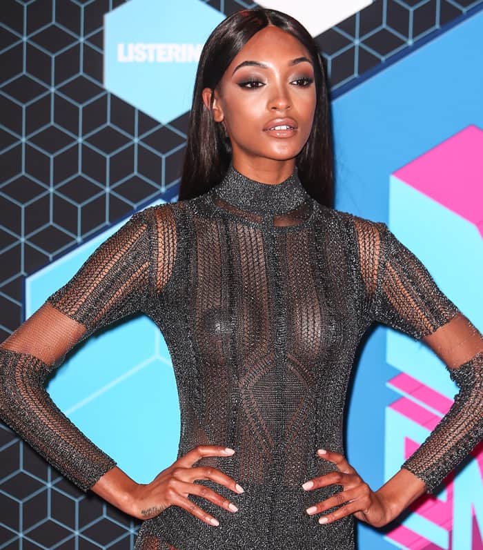 Jourdan Dunn opted for minimal coverage underneath, sporting only black briefs