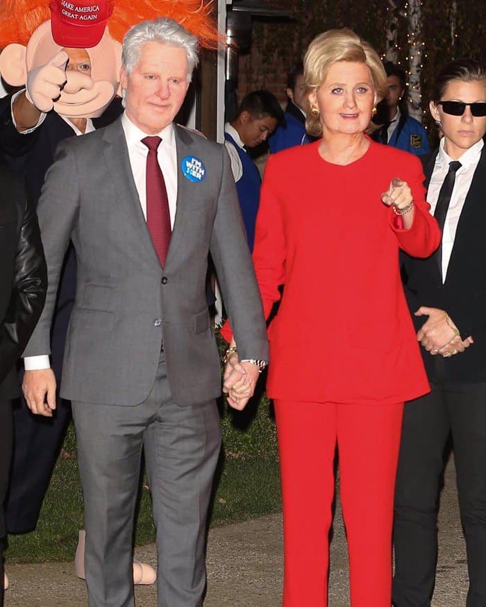 Katy Perry makes a political statement as Hillary Clinton, with friend Michael Kives as Bill, at Kate Hudson’s Halloween bash
