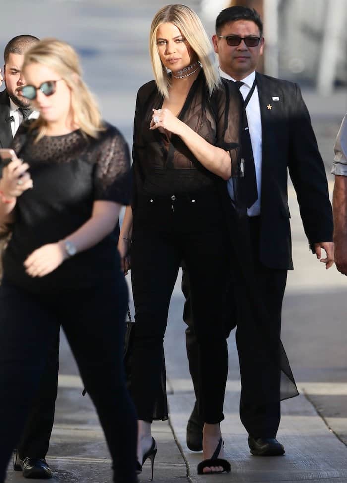 Khloé Kardashian's sexy mesh blouse atop the skinny jeans