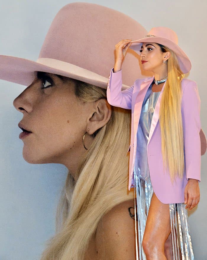 Lady Gaga in a silver dress and a bubblegum pink blazer