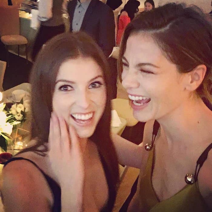 Michelle Monaghan and Anna Kendrick share a joyful moment at the 2016 ELLE Women in Hollywood Awards, capturing their playful friendship in a candid snap