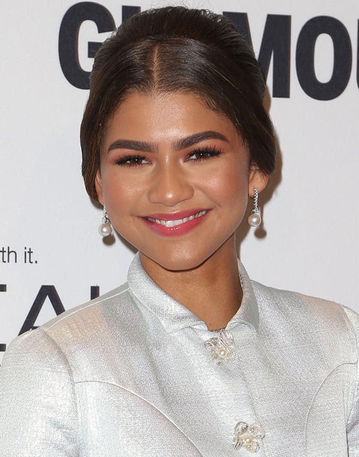 Zendaya shines with pearl drop earrings and soft pink makeup