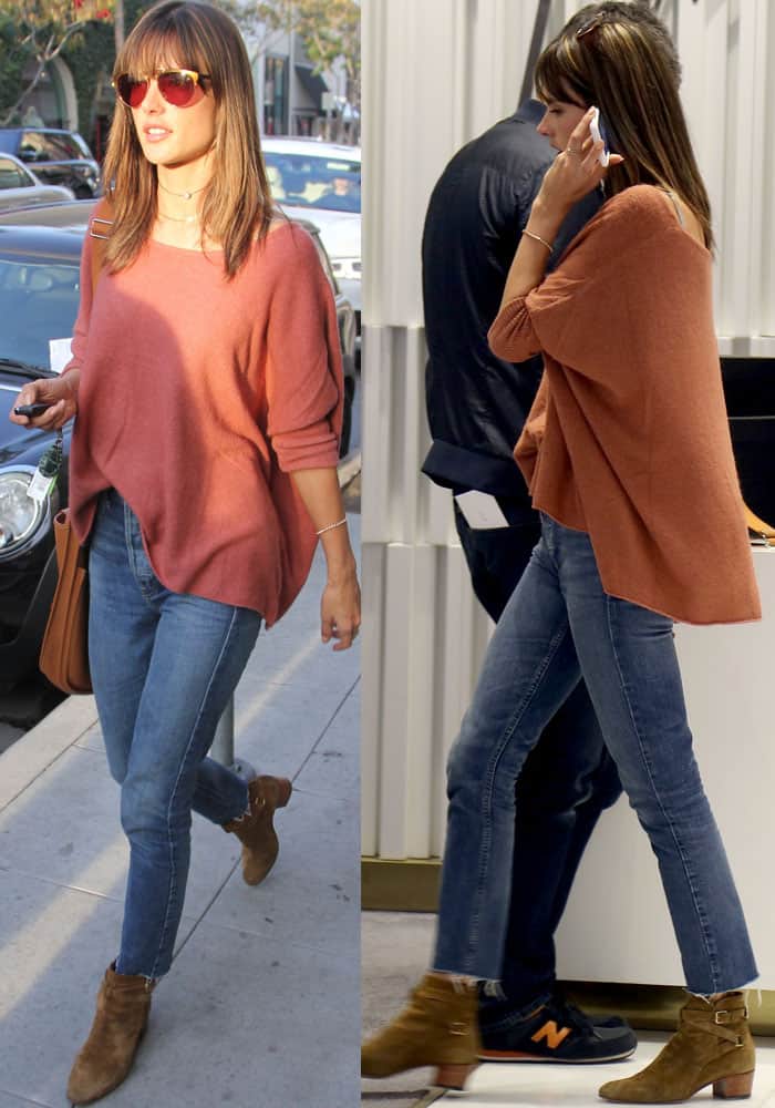 Alessandra Ambrosio pairs her rust-toned knit sweater and high-waisted skinny jeans with Saint Laurent "Blake" suede ankle boots for a polished, off-duty model look
