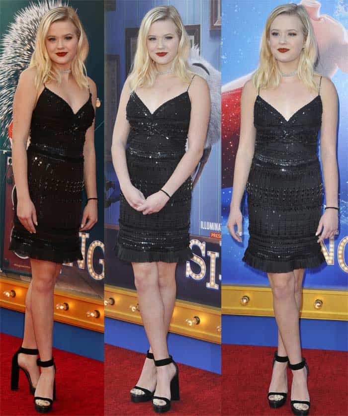 Ava Phillippe strikes graceful poses on the red carpet at the "Sing" premiere, channeling her mother’s elegance in a chic black dress and ankle-strap heels