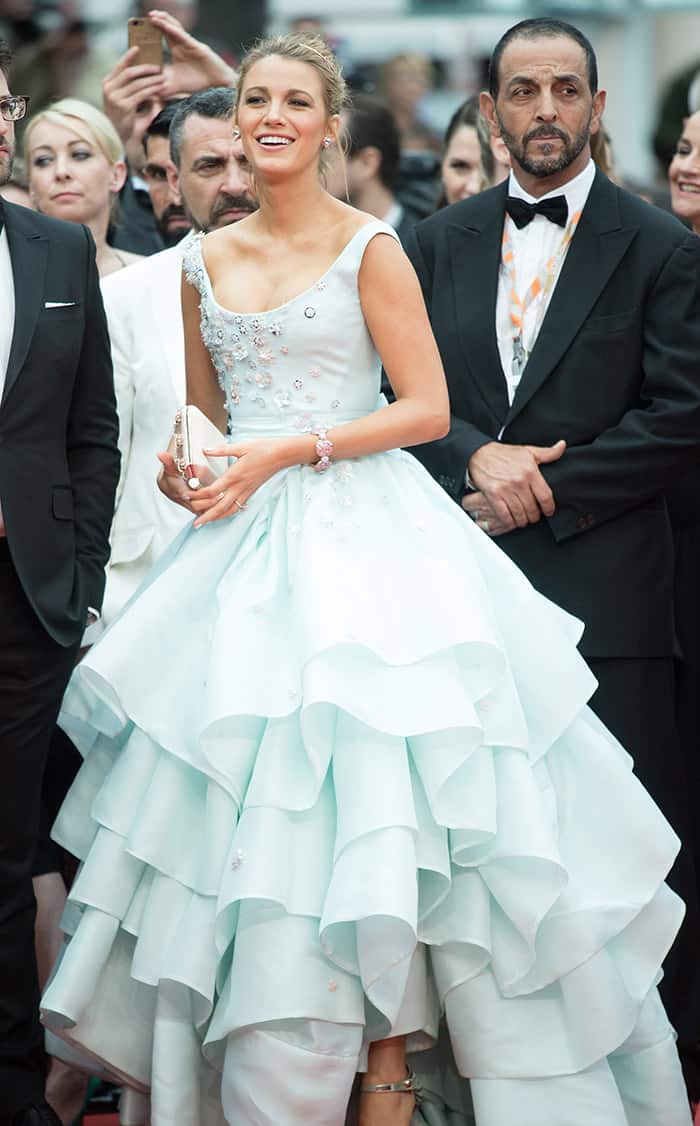 Blake Lively radiates joy and grace in a fairy tale-inspired Vivienne Westwood gown, captivating the crowd at the Cannes Film Festival