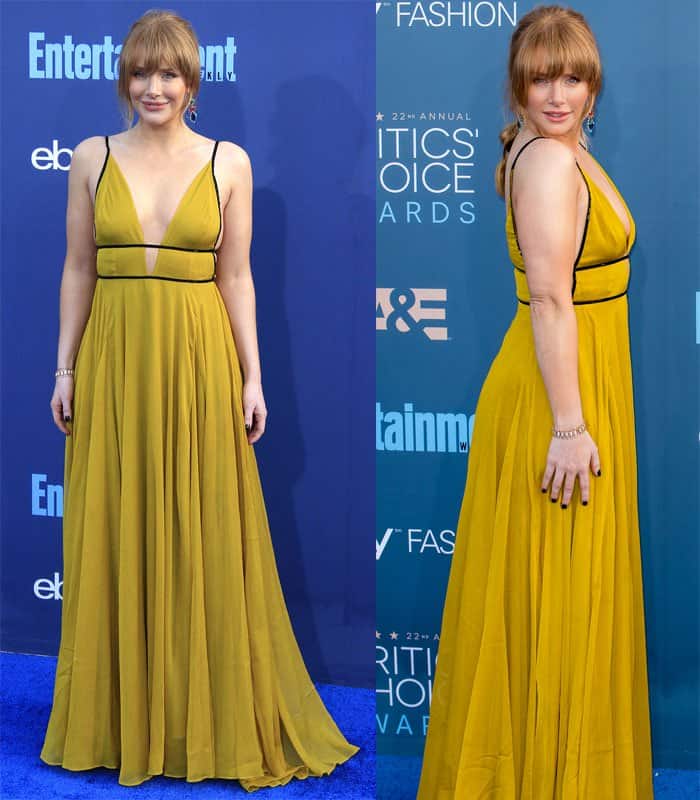 Bryce Dallas Howard stuns at the Critics' Choice Awards in a vibrant mustard-yellow Topshop gown, pairing the plunging neckline with simple yet elegant accessories for a chic red carpet look