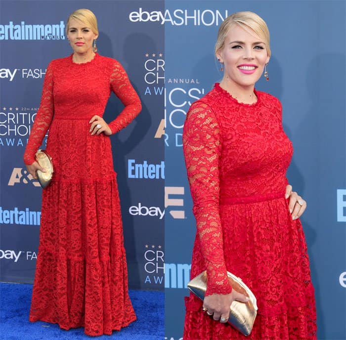 Busy Philipps commands attention at the Critics' Choice Awards in a bold red lace Martha Medeiros gown, pairing the vibrant look with a chic updo and a metallic clutch for a stunning finish