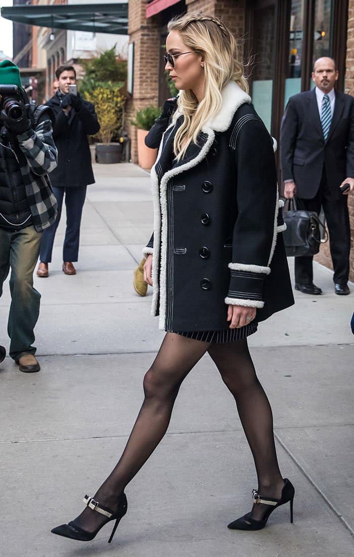 Jennifer Lawrence flaunted her toned legs in sheer black stockings while stepping out in New York, pairing them with sleek Nicholas Kirkwood Mary Jane pumps
