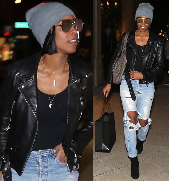 Kelly Rowland completes her edgy look with layered dainty necklaces, subtle makeup, a sleek bob hairstyle, and oversized aviator sunglasses