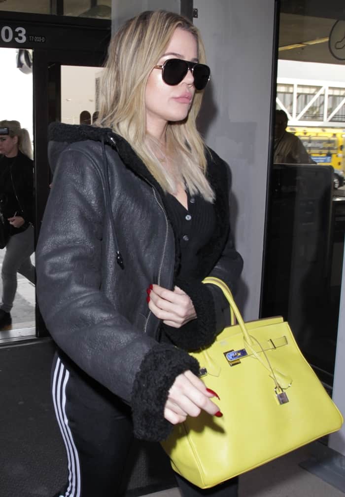 Khloé Kardashian's lime colored Hermès handbag