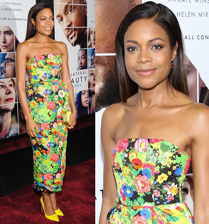 Naomie Harris paired her vibrant Rosie Assoulin floral dress with a metallic Amanda Pearl clutch and bold yellow Rupert Sanderson pumps, creating a striking, color-coordinated red carpet moment
