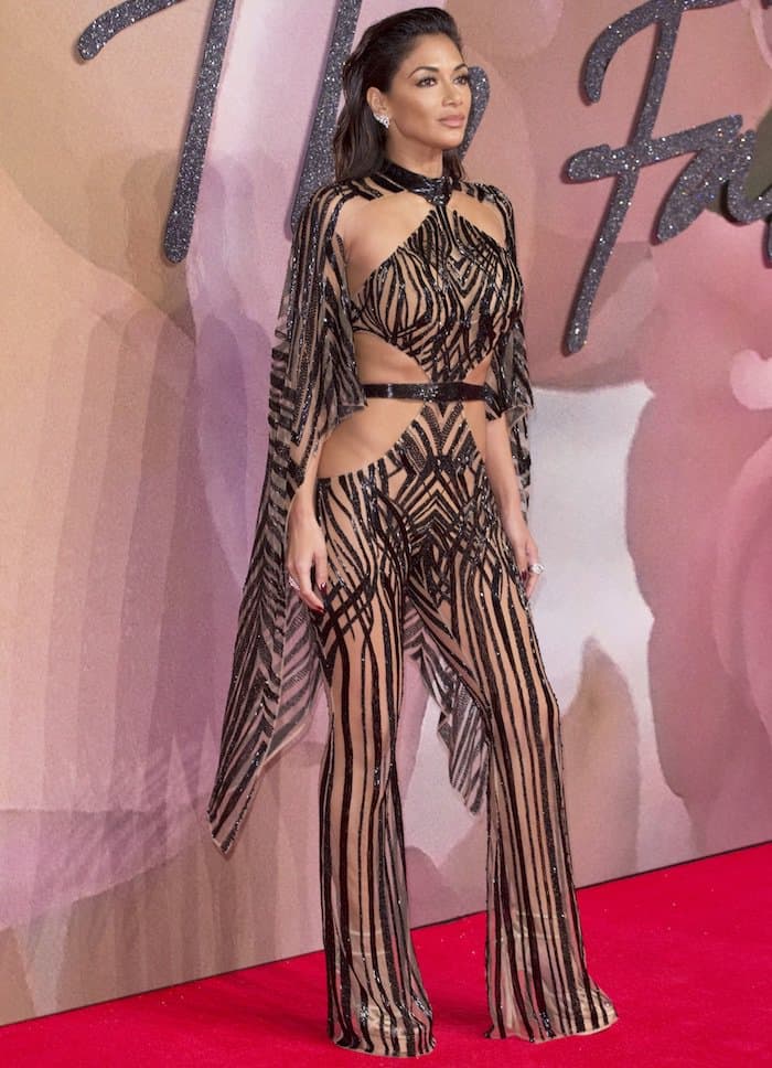 Nicole Scherzinger flaunts her killer body in a Julien Macdonald beaded jumpsuit and cape