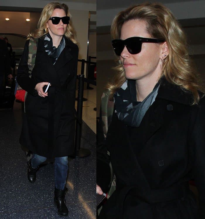 Elizabeth Banks styled her blonde locks in loose waves, adding a soft, relaxed touch to her chic, incognito airport look