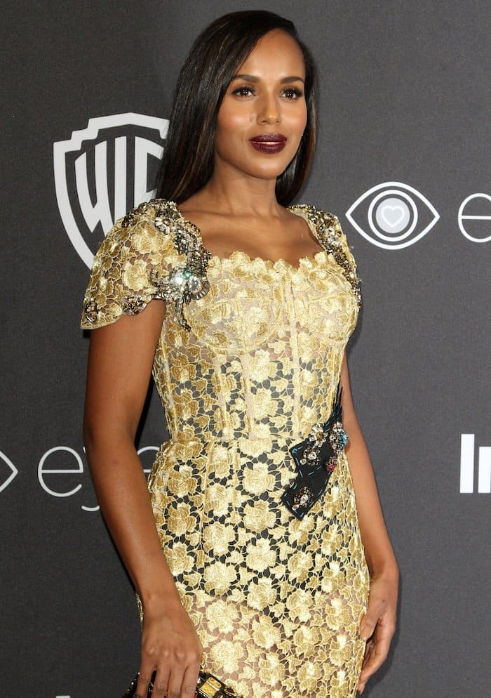 Kerry Washington dazzles with sleek, side-parted hair and bold, dark lipstick