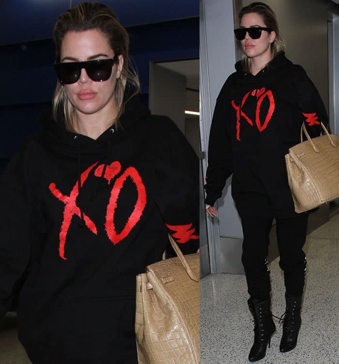 Khloé Kardashian at LAX Airport on January 5, 2017, styled casually in The Weeknd XO Starboy hoodie, paired with a beige crocodile Hermès Birkin bag