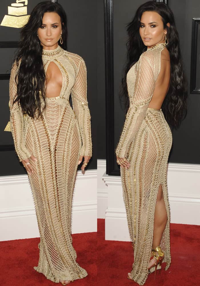 Replicate Demi Lovato's Grammy look with a shimmering gold-knit dress featuring cutouts and metallic details, paired with bold gold heels and statement jewelry for red-carpet-worthy glam