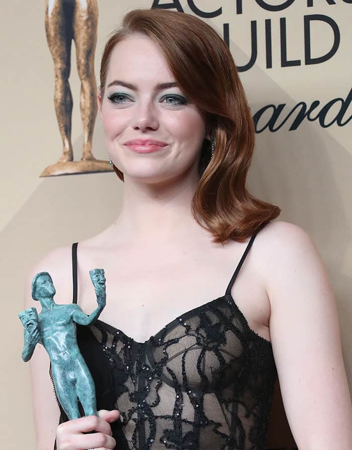 Emma Stone dazzles in an Alexander McQueen sheer floral gown at the 23rd Screen Actors Guild Awards