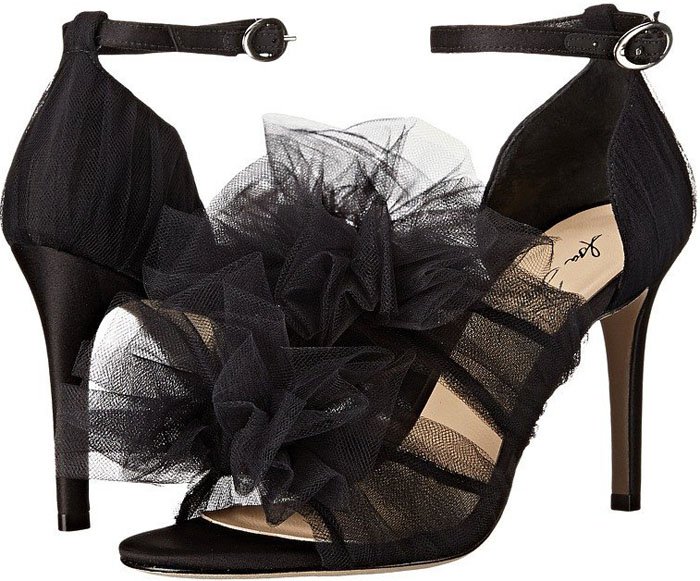 Isa Tapia’s black “Gigi” tulle sandal features soft layered tulle ruffles, a slim ankle strap, and a sculptural, romantic silhouette that defines the designer’s signature feminine aesthetic