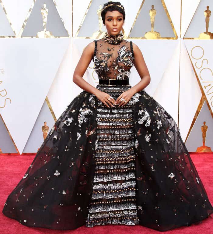 Janelle Monáe stuns in an intricately embellished Elie Saab gown at the 2017 Academy Awards, combining bold elegance with a dramatic, sheer design