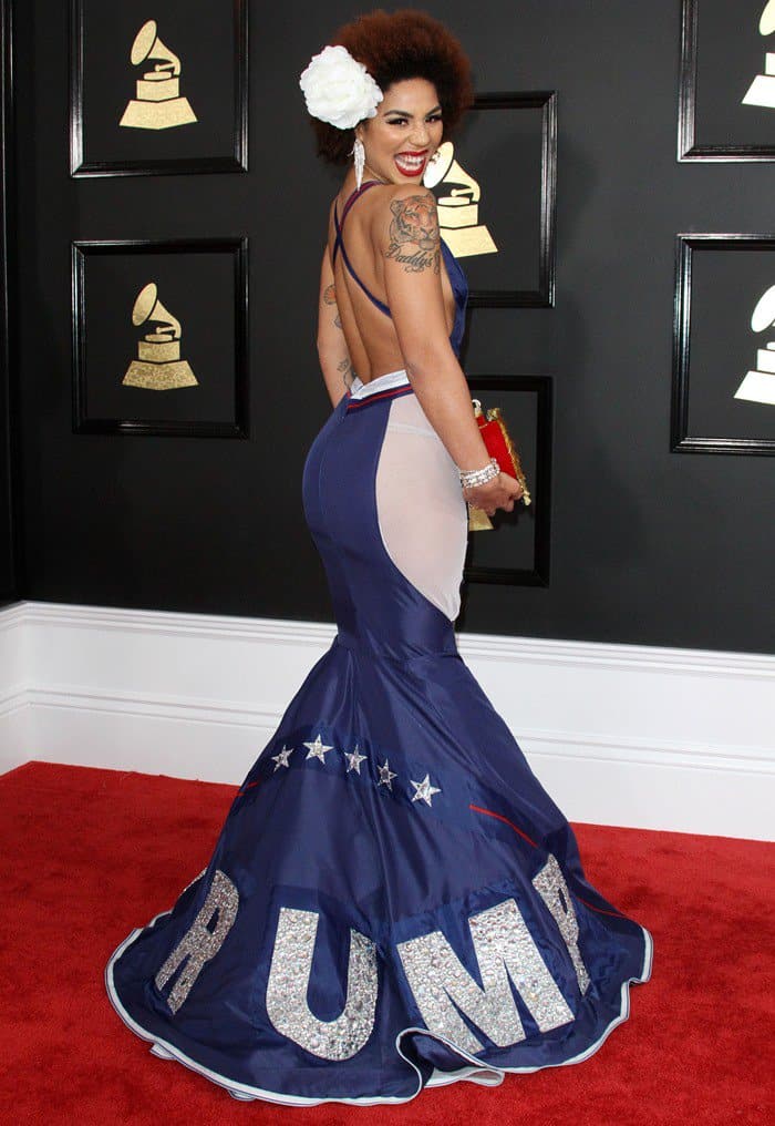 Singer Joy Villa donned a dress designed by Andre Soriano with President Trump‘s “Make America Great Again” slogan emblazoned on the front at the 2017 Grammy Awards