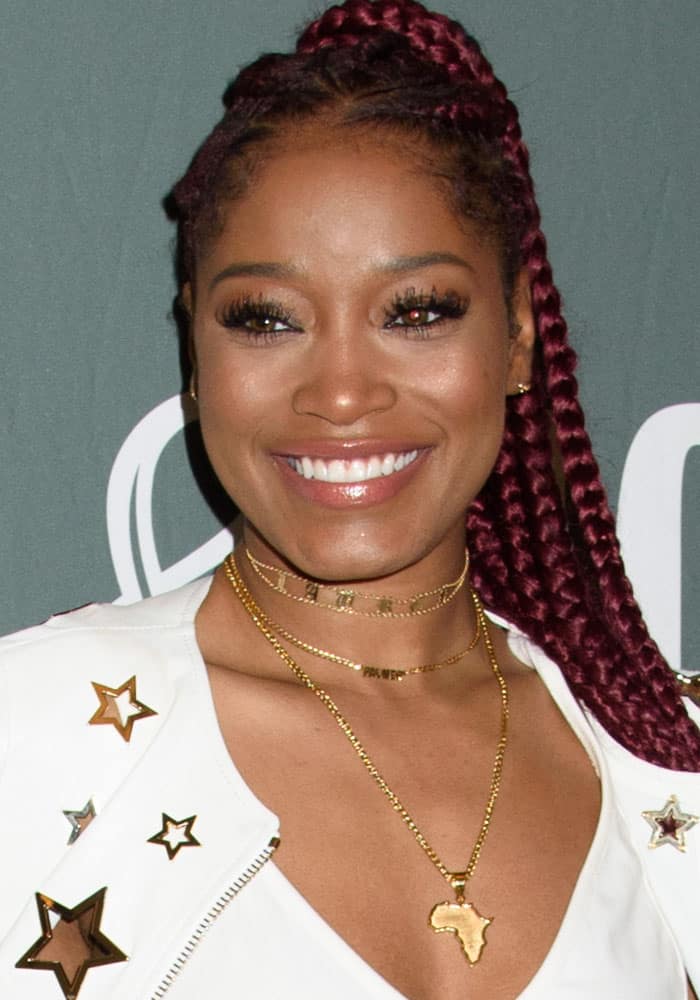 Keke Palmer wears a beautiful Africa necklace to promote her book "I Don't Belong to You: Quiet the Noise and Find Your Voice" at Barnes Noble