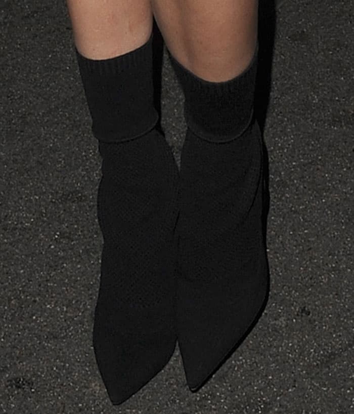 Kendall Jenner complemented her legs with heeled ankle boots that added some extra height