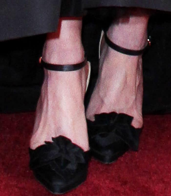 Kirsten wears a pair of Christian Lacroix pumps that she previously wore at the 2016 amFAR gala