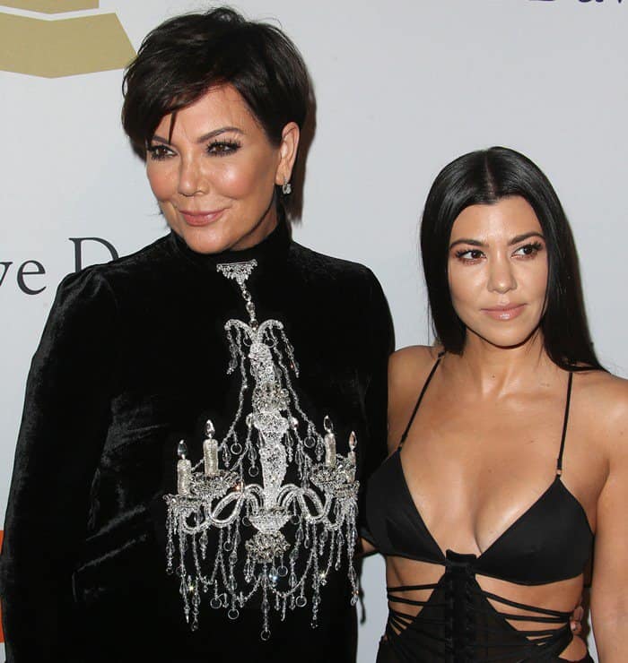 Kris Jenner, standing at 5ft 5 ½ (166.4 cm), towers over her daughter, Kourtney Kardashian, who is 5ft 0 (152.4 cm), highlighting their noticeable height difference on the red carpet