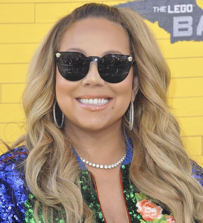 Mariah Carey rocking a Gucci appliquéd sequined tulle and satin bomber jacket