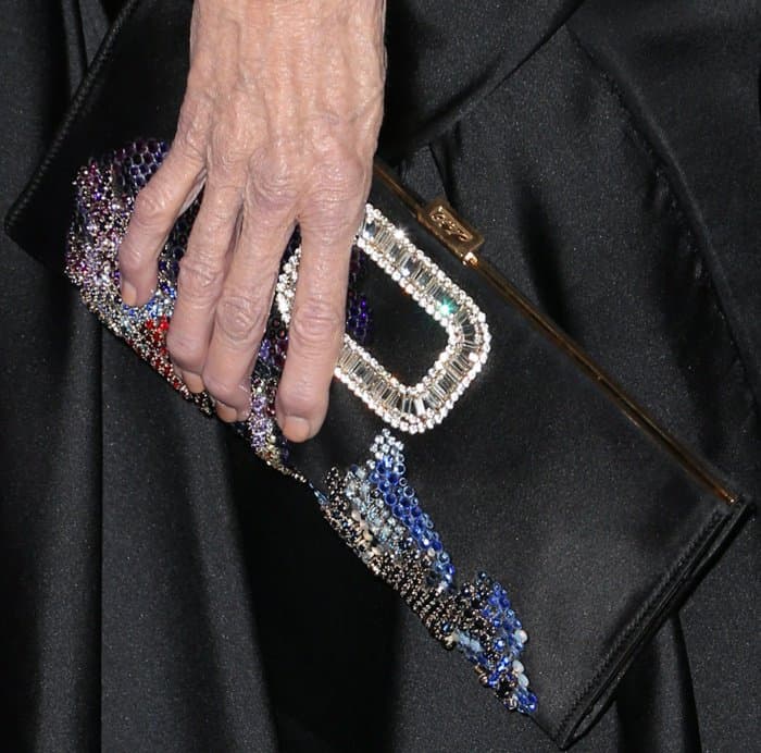 Jane Fonda carried an embellished black satin clutch from Roger Vivier adorned with sparkling crystals that perfectly complemented her gown