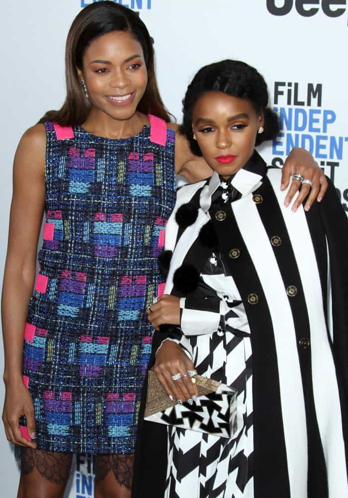 Naomie Harris, standing at 5ft 7 (170.2 cm) in a vibrant tweed mini dress with lace trim, towered over the petite 5ft 0 (152.4 cm) Janelle Monáe