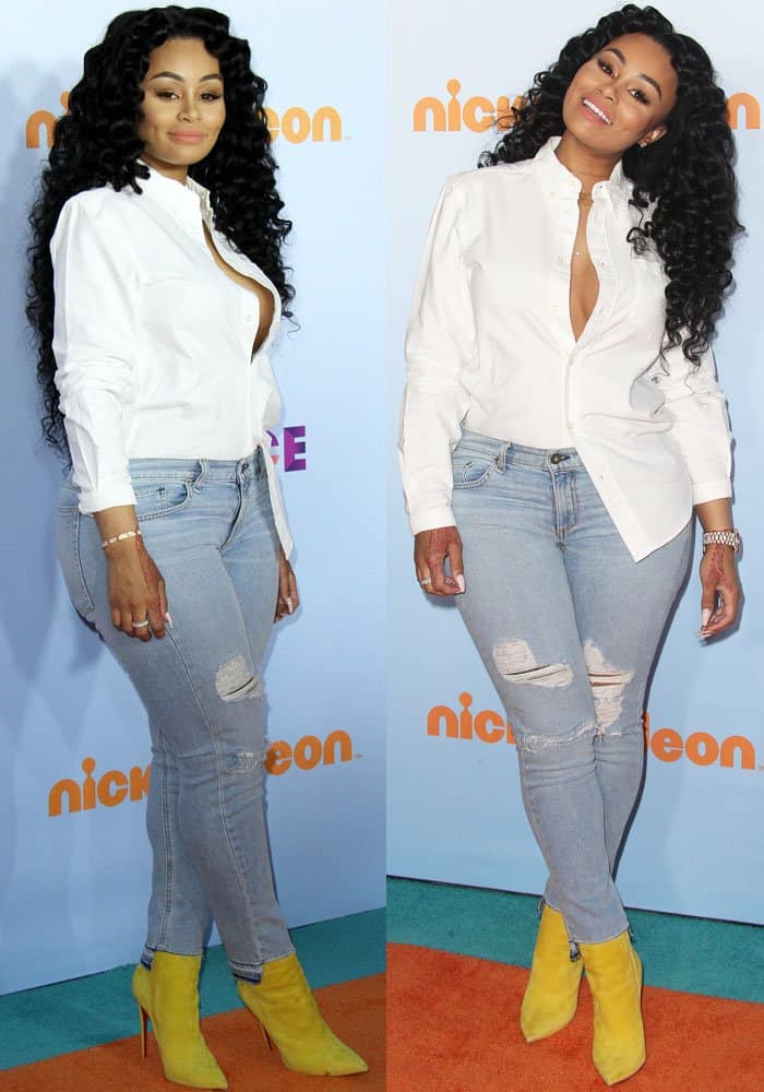 Blac Chyna styles ripped light-wash jeans with yellow Christian Louboutin boots at the 2017 Kids' Choice Awards