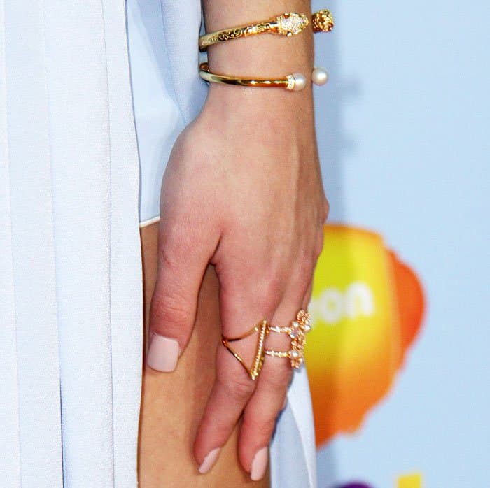 Chloe Lukasiak's generous layering of rings and cuffs from Nialaya Jewelry