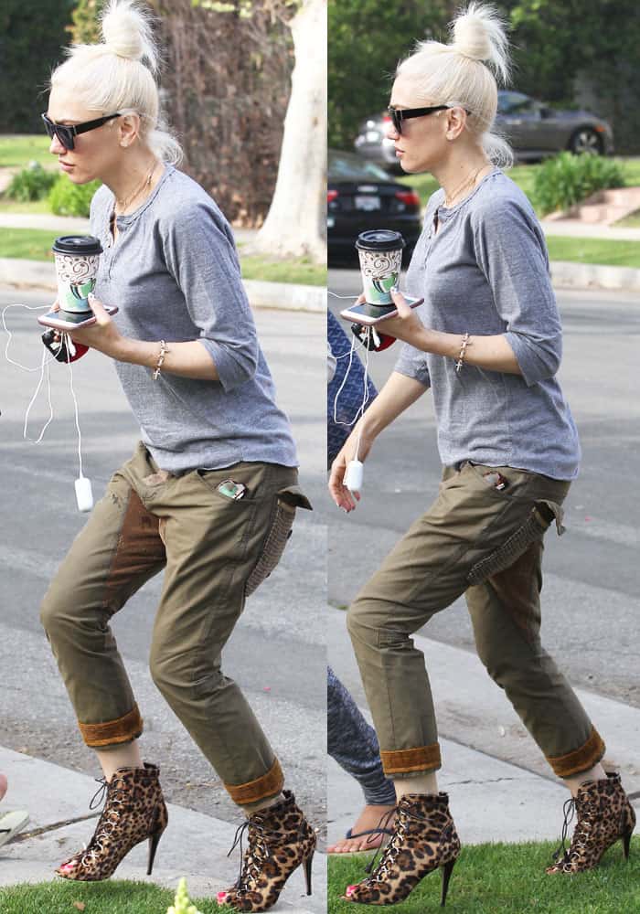 Balancing relaxed olive-green pants with towering Brian Atwood leopard-print booties, Stefani turns a simple family outing into a signature fashion moment