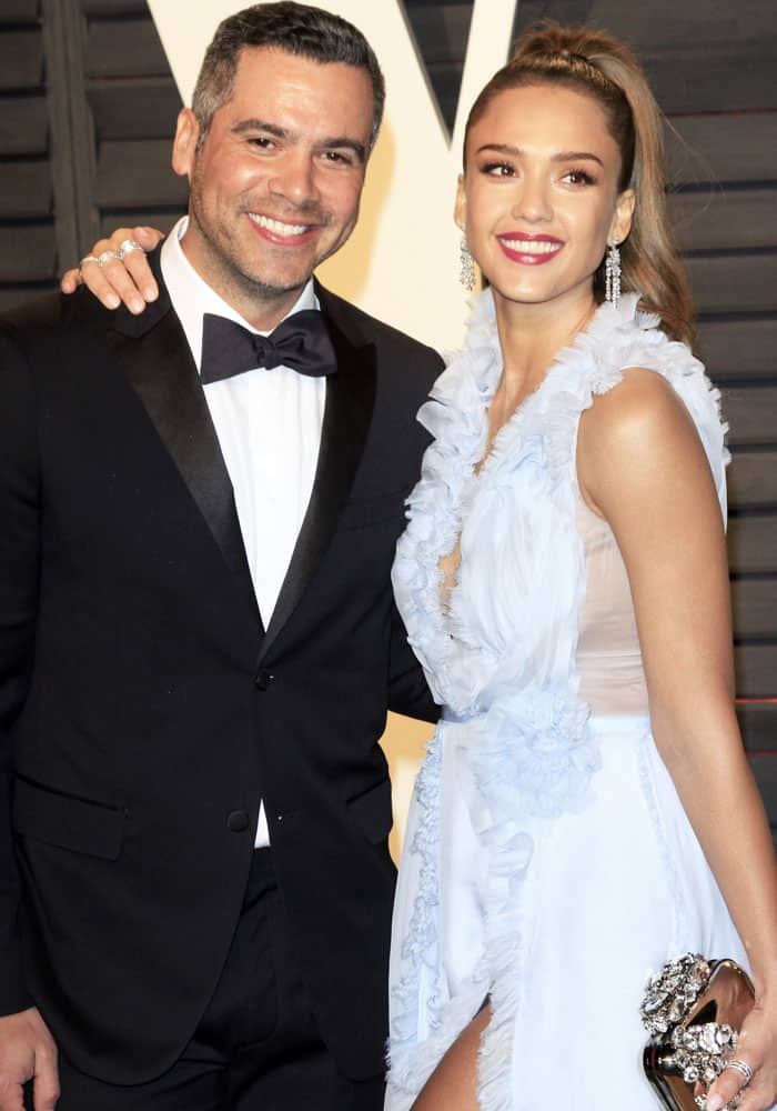 Jessica Alba radiates elegance in a ruffled pale blue gown, while Cash Warren keeps it classic in a sharp black tuxedo, making them a picture-perfect red carpet duo