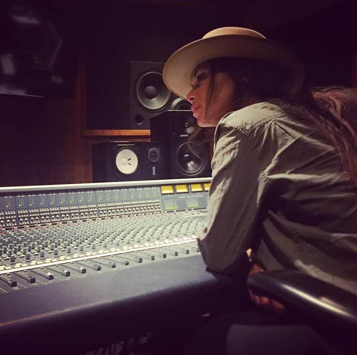 Nicole Scherzinger sparked comeback rumors as she shared a behind-the-scenes look from the recording studio, hinting at new music in the works